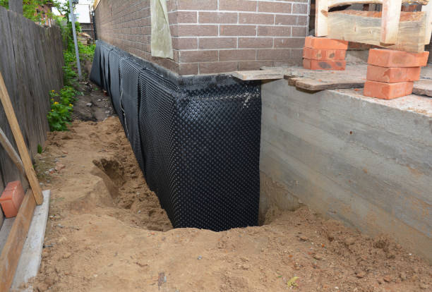 Happy homeowners after waterproofing job in Bryans Road